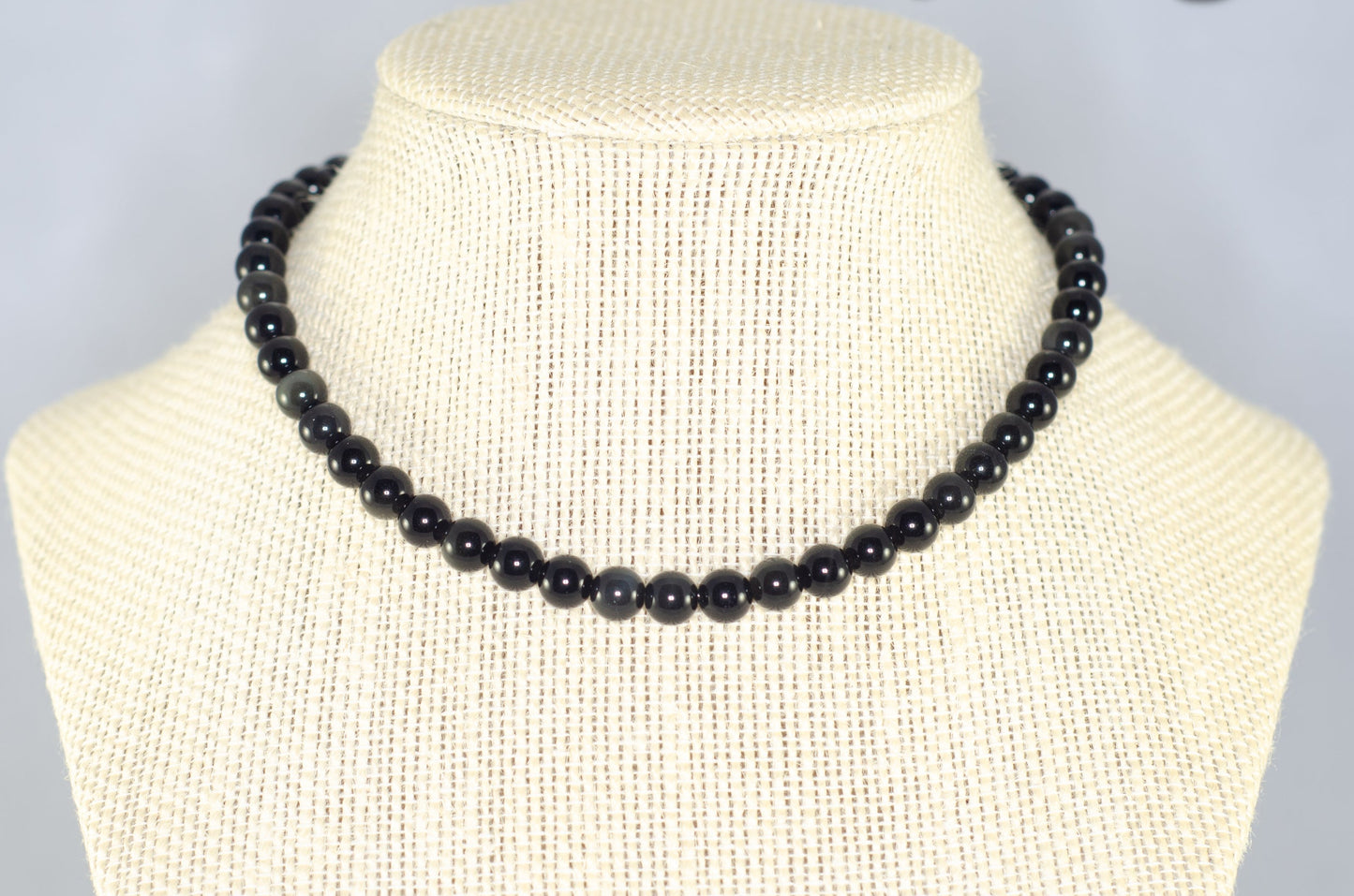 6mm Black Obsidian Crystal Choker Necklace displayed on a bust.