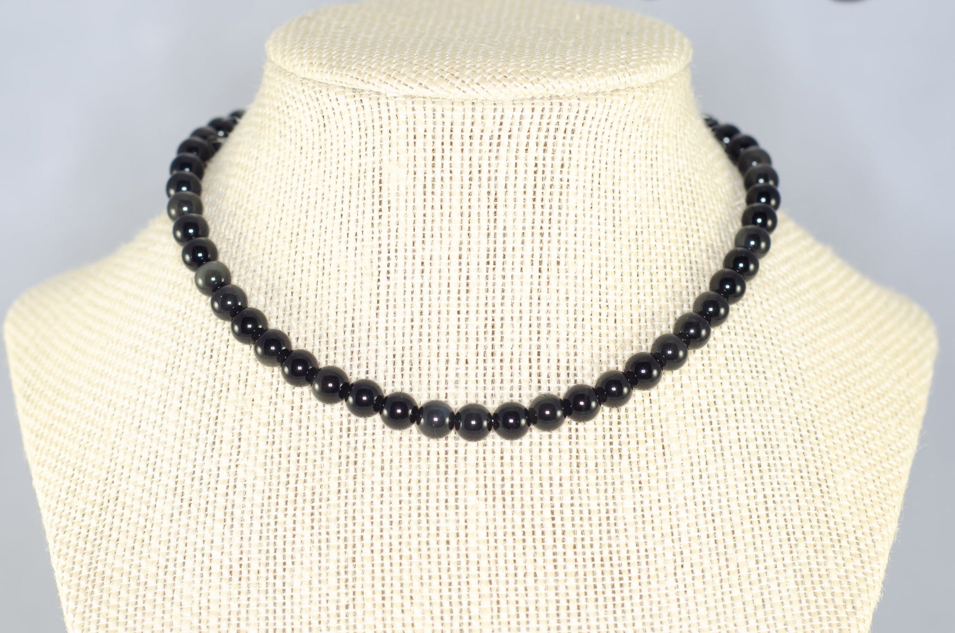 6mm Black Obsidian Crystal Choker Necklace displayed on a bust.