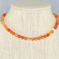 6mm Carnelian Crystal Choker Necklace displayed on a bust.