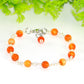 Close up of 6mm Carnelian Link Bracelet for Women.