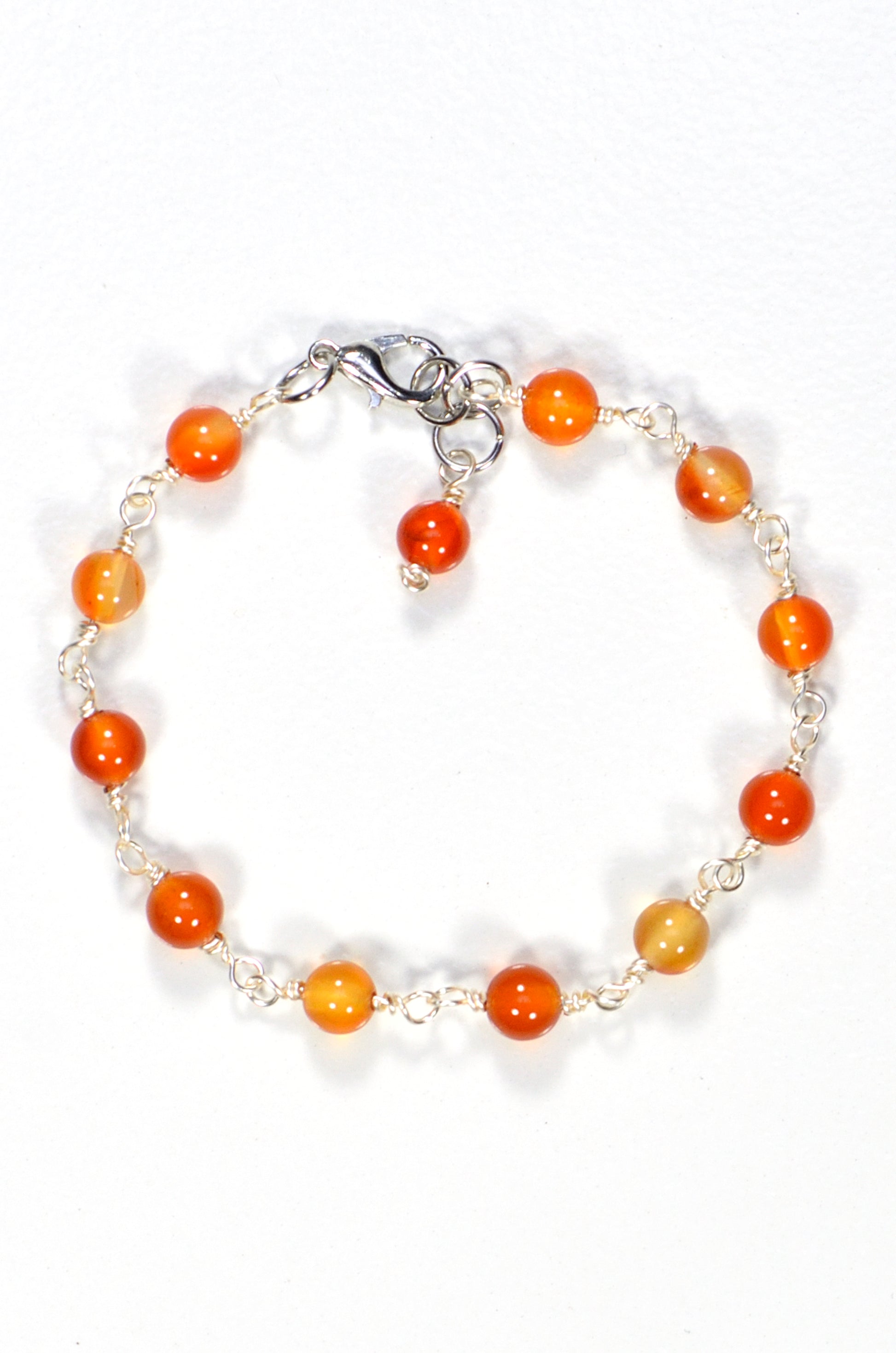 Top view of 6mm Carnelian Link Bracelet for Women.