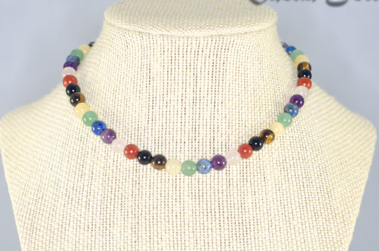 6mm Chakra Gemstone Beaded Choker Necklace displayed on a bust.