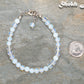 6mm Clear White Opalite Beaded Anklet beside a dime.