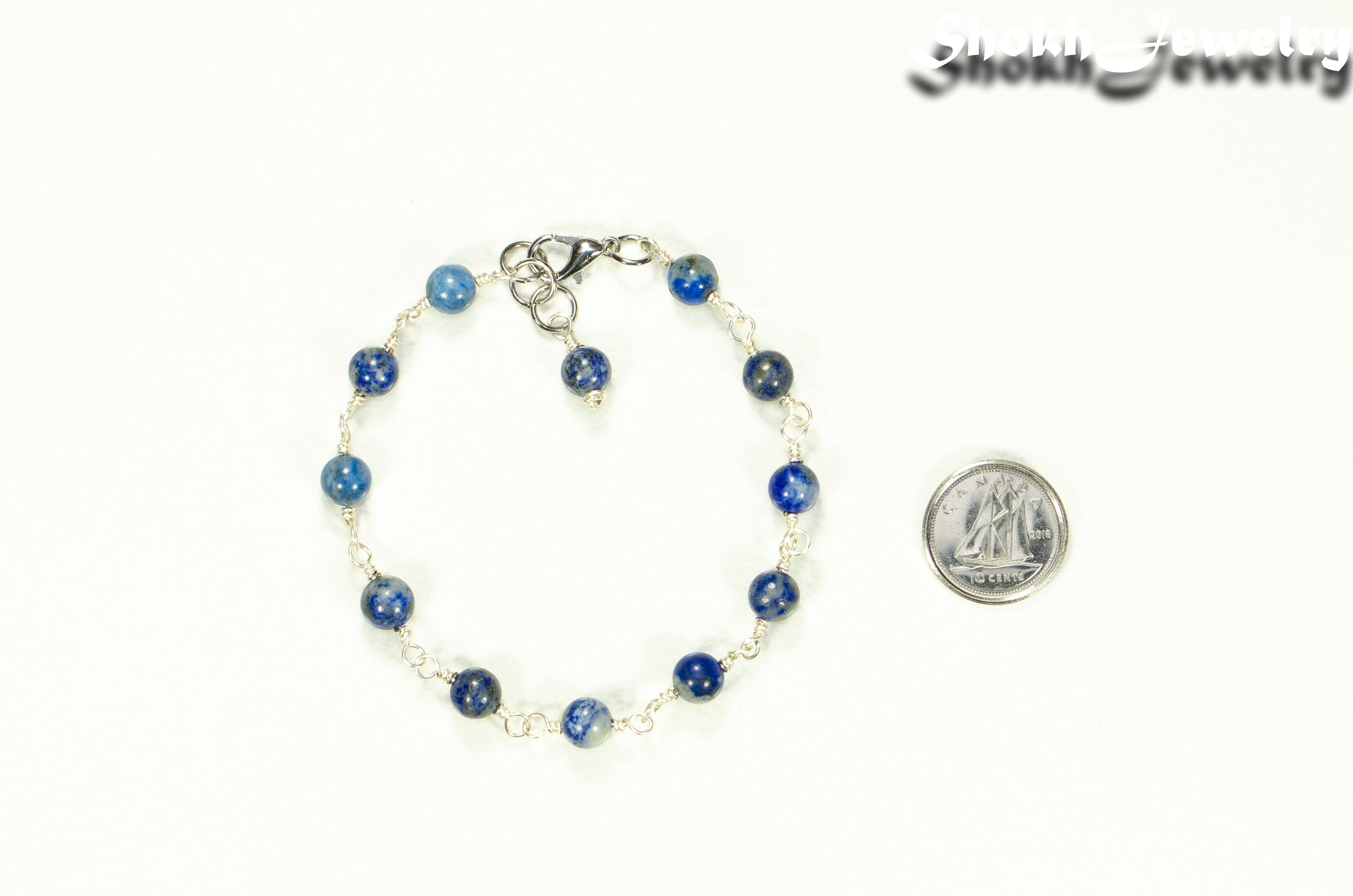 6mm Lapis Lazuli Link Chain anklet beside a dime.