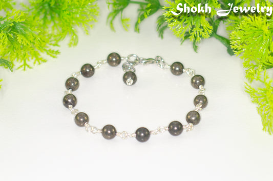 6mm Natural Pyrite Link Bracelet with Clasp and a dangle.