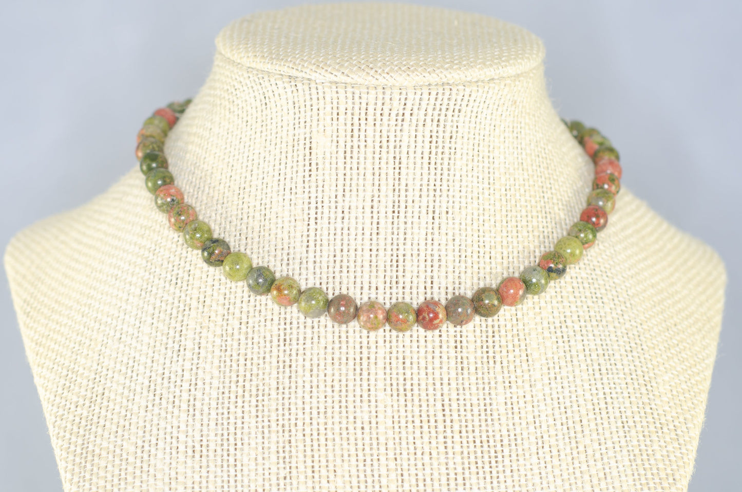 6mm Natural Unakite Choker Necklace displayed on a bust.