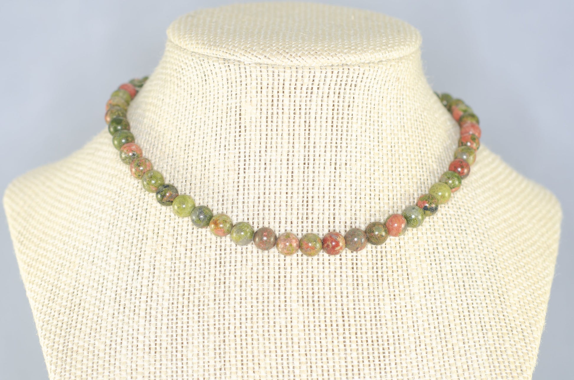 6mm Natural Unakite Choker Necklace displayed on a bust.