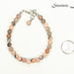 6mm Pink Zebra Jasper Beaded Anklet beside a dime.