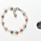 6mm Pink Zebra Jasper Link Bracelet eside a dime.