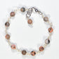 Top view of 6mm Pink Zebra Jasper Link Bracelet.