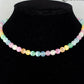 6mm Rainbow Selenite Beaded Choker Necklace displayed on a bust.