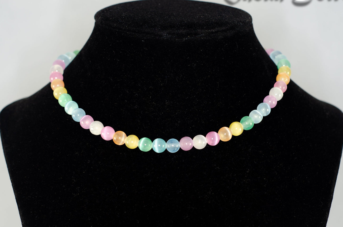 6mm Rainbow Selenite Beaded Choker Necklace displayed on a bust.