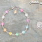 6mm Rainbow Selenite Link Anklet beside a dime.