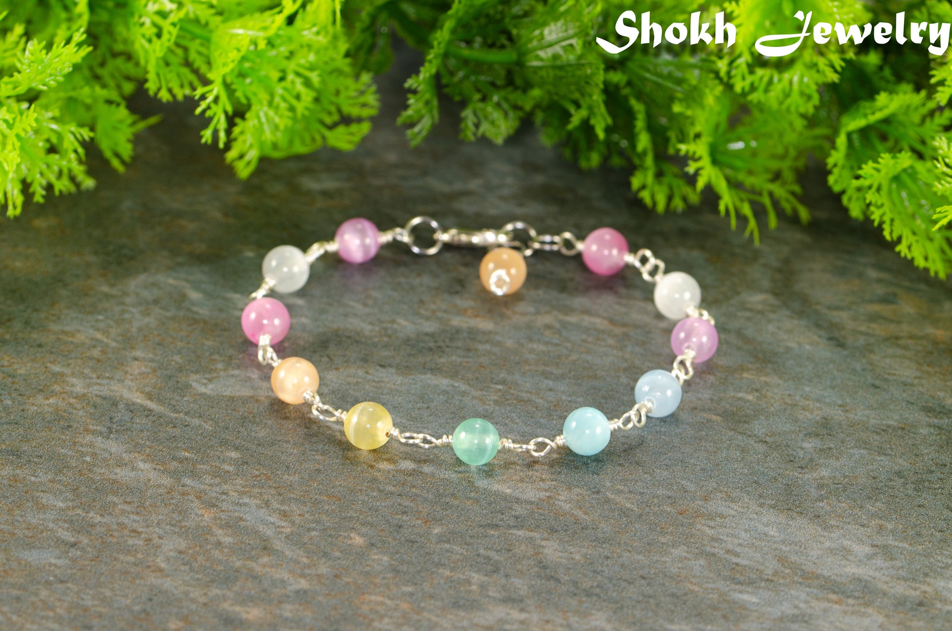 6mm Rainbow Selenite Link Bracelet with clasp and a dangle.