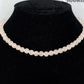 6mm Rose Quartz Crystal Choker Necklace displayed on a bust.
