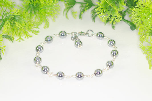 6mm Silver Hematite Link Bracelet with Clasp and a dangle.