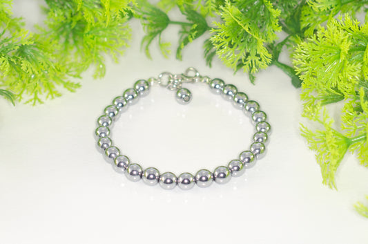 6mm Silver Hematite Stone Bracelet with Clasp and a dangle.