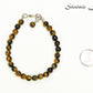 6mm Tiger's Eye Beaded Anklet beside a dime.