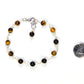 6mm Tiger's Eye Link Chain Bracelet beside a dime.