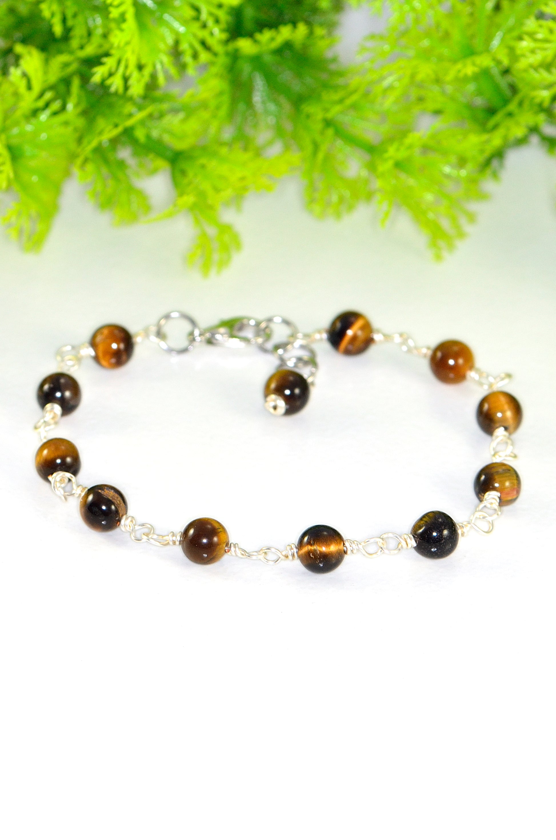 Close up of 6mm Tiger's Eye Link Chain Bracelet.