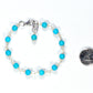 6mm Turquoise Howlite Bracelet beside a dime.