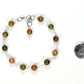 6mm Unakite Jasper Link Bracelet beside a dime.
