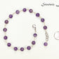 8mm Amethyst Crystal Link Choker Necklace beside a dime.