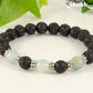 Close up of 8mm Black Lava Stone and Amazonite Bracelet.