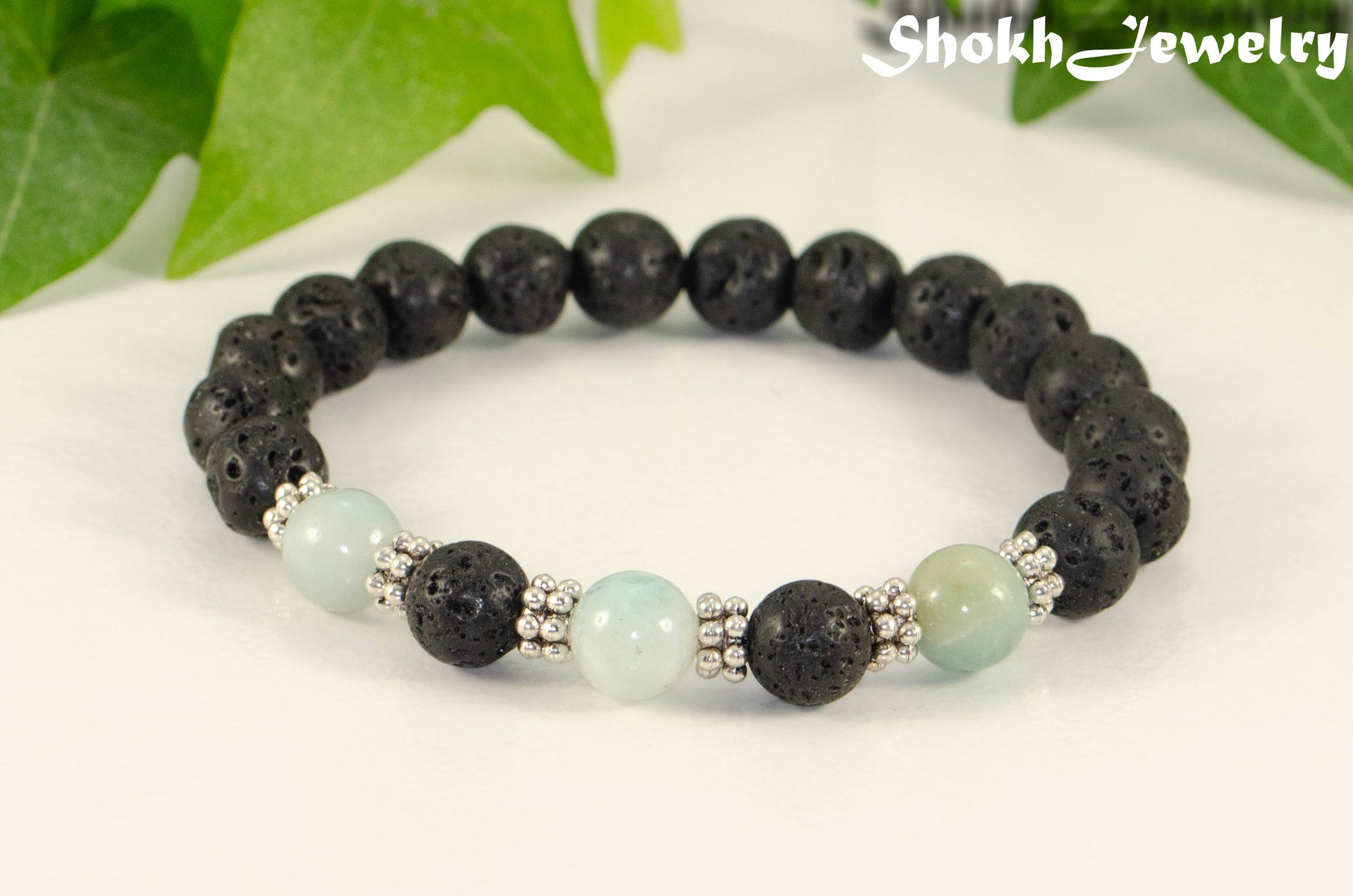 Close up of 8mm Black Lava Stone and Amazonite Bracelet.