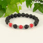8mm Black Lava Stone and Red Howlite Bracelet.