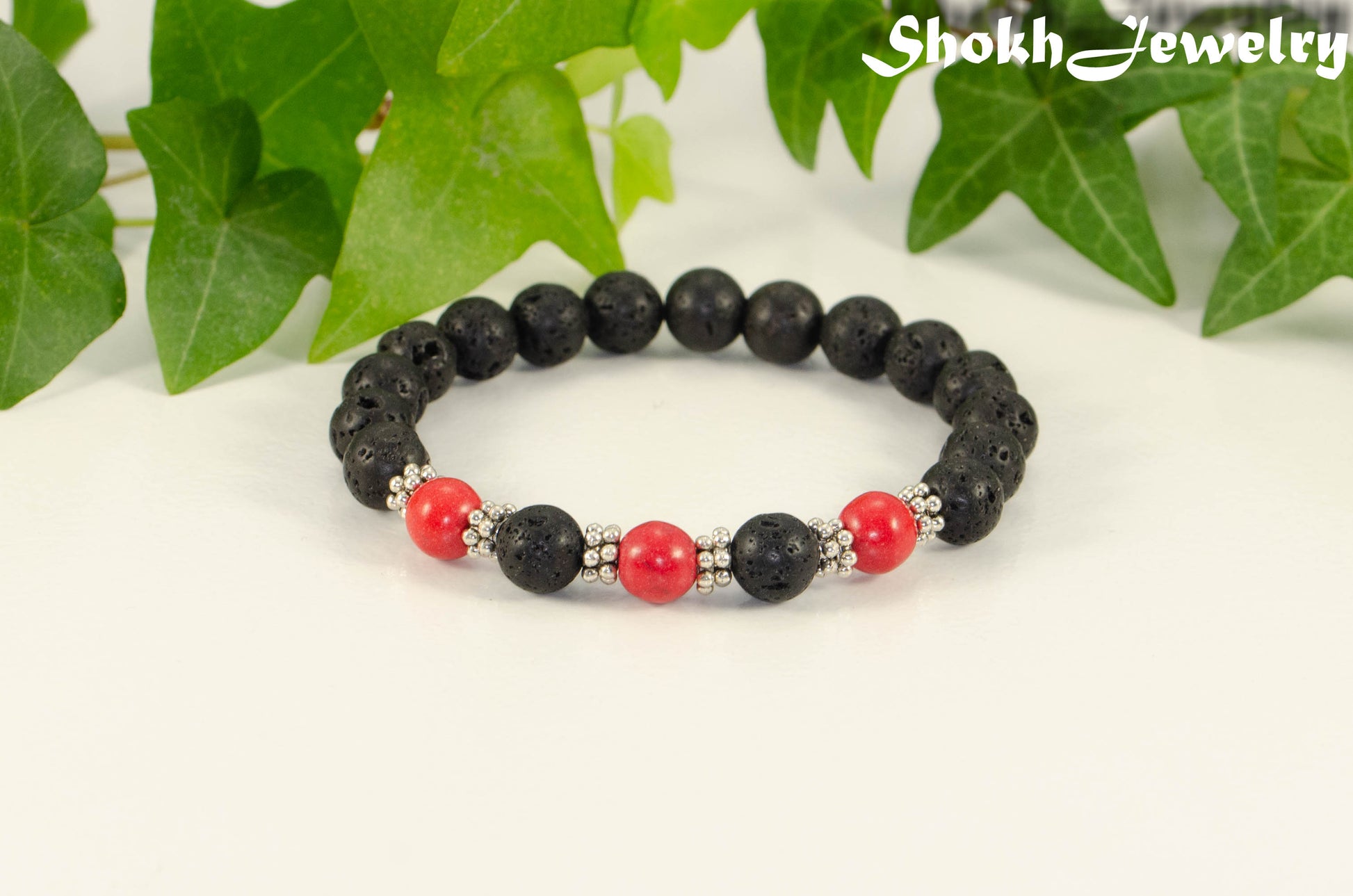 8mm Black Lava Stone and Red Howlite Bracelet.
