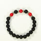 Top view of 8mm Black Lava Stone and Red Howlite Bracelet.