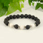 8mm Black Lava Stone and White Howlite Bracelet.
