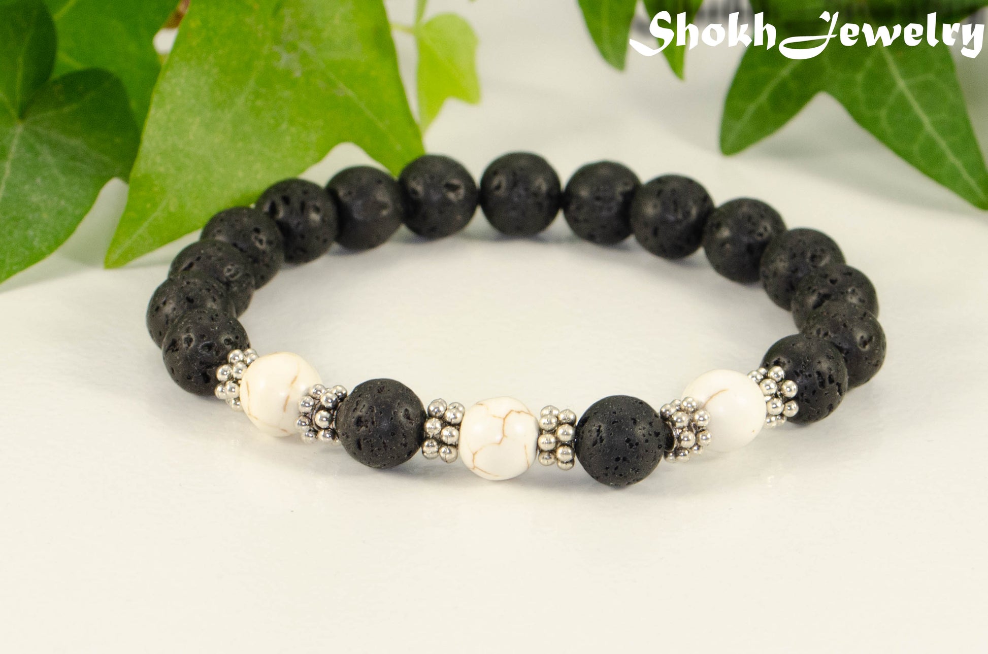 Close up of 8mm Black Lava Stone and White Howlite Bracelet.