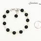 8mm Black Obsidian Link Anklet beside a dime.