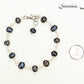 Black Dyed Freshwater Pearls Link Chain Bracelet beside a dime.