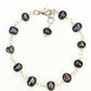 Top view of Black Dyed Freshwater Pearls Link Chain Bracelet.