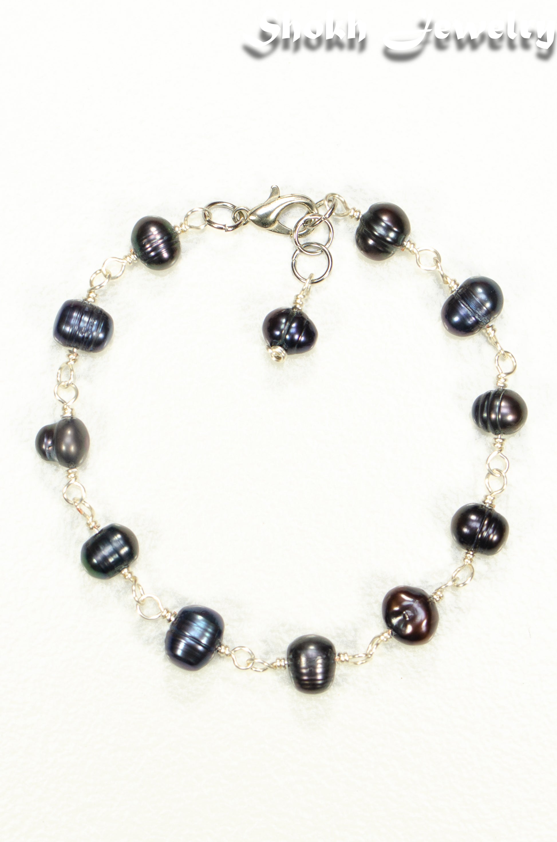 Top view of Black Dyed Freshwater Pearls Link Chain Bracelet.