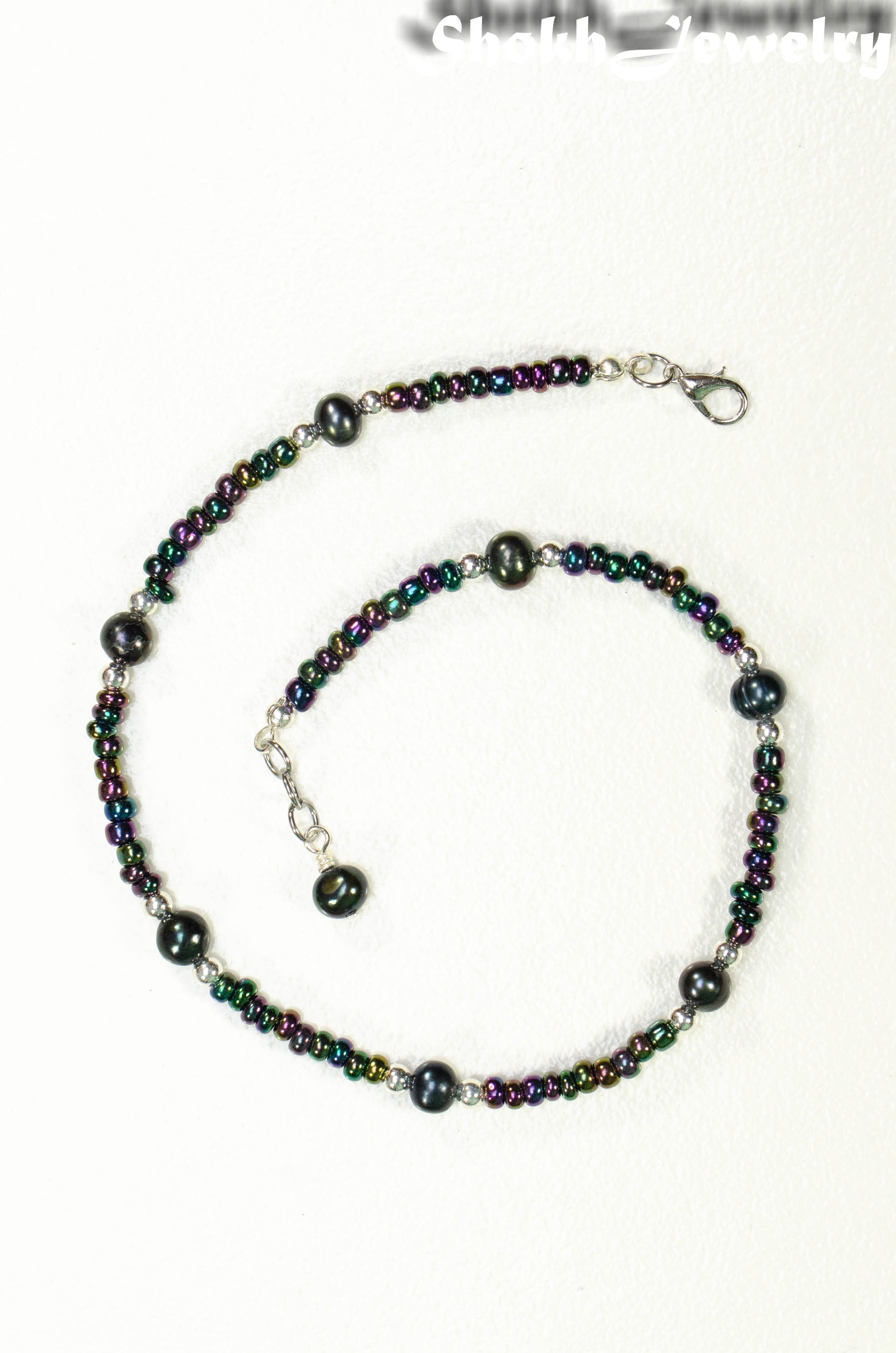 Top view of Black Freshwater Pearl and Seed Bead Choker Necklace.