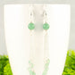 Close up of Cascading Green Aventurine Crystal Drop Earrings.