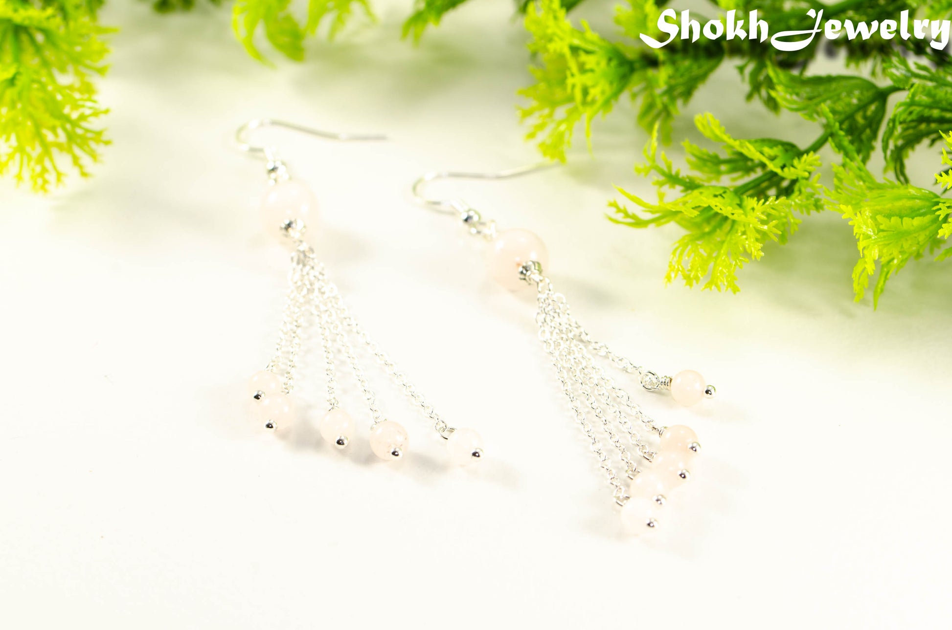 Cascading Rose Quartz Crystal Drop Earrings for women.