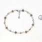 Chunky Tibetan Silver Flower Choker Necklace beside a dime.