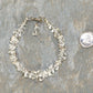 Clear Quartz Crystal Chip Bracelet beside a dime.