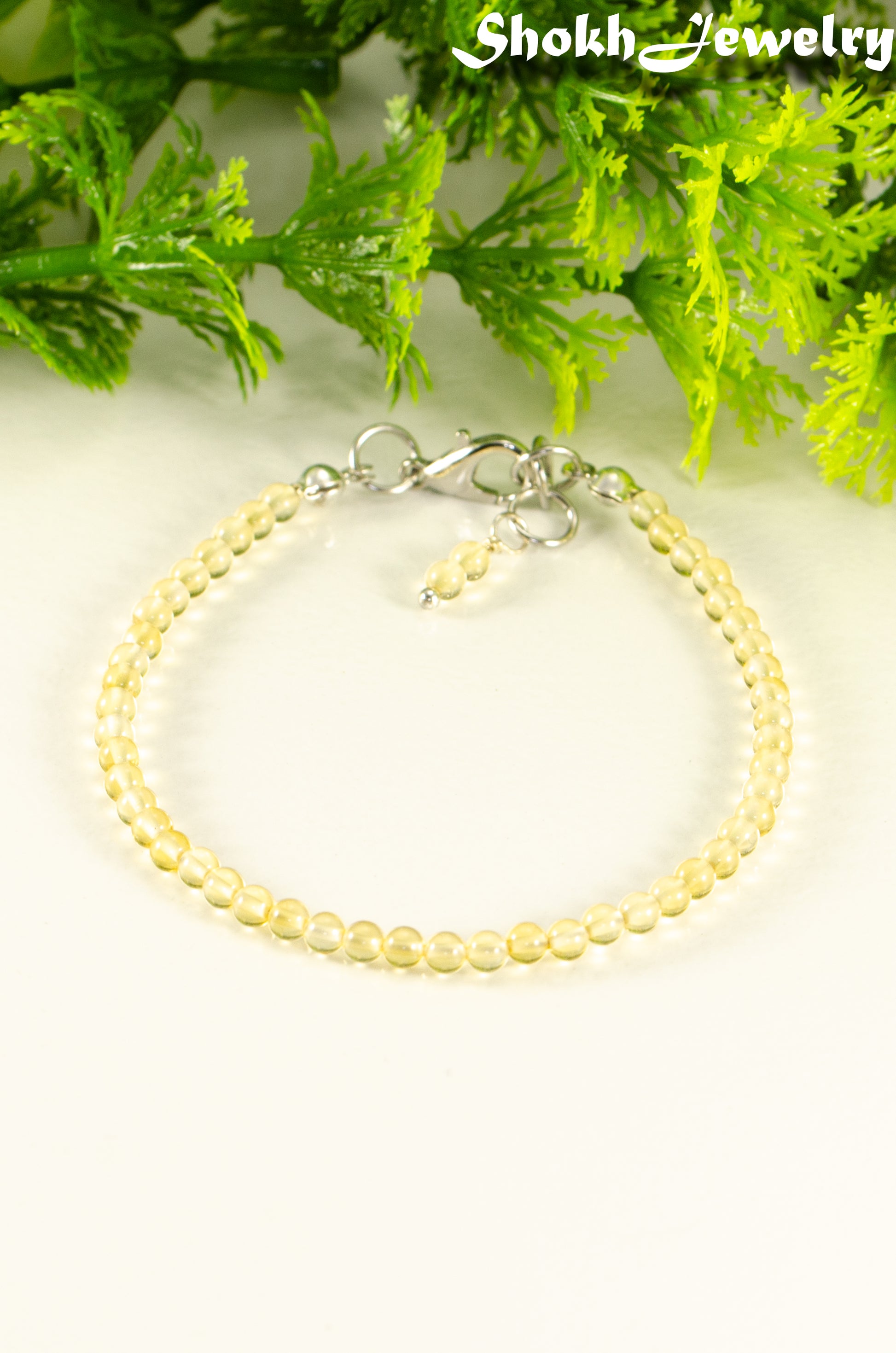 Close up of Dainty Citrine anklet for women.