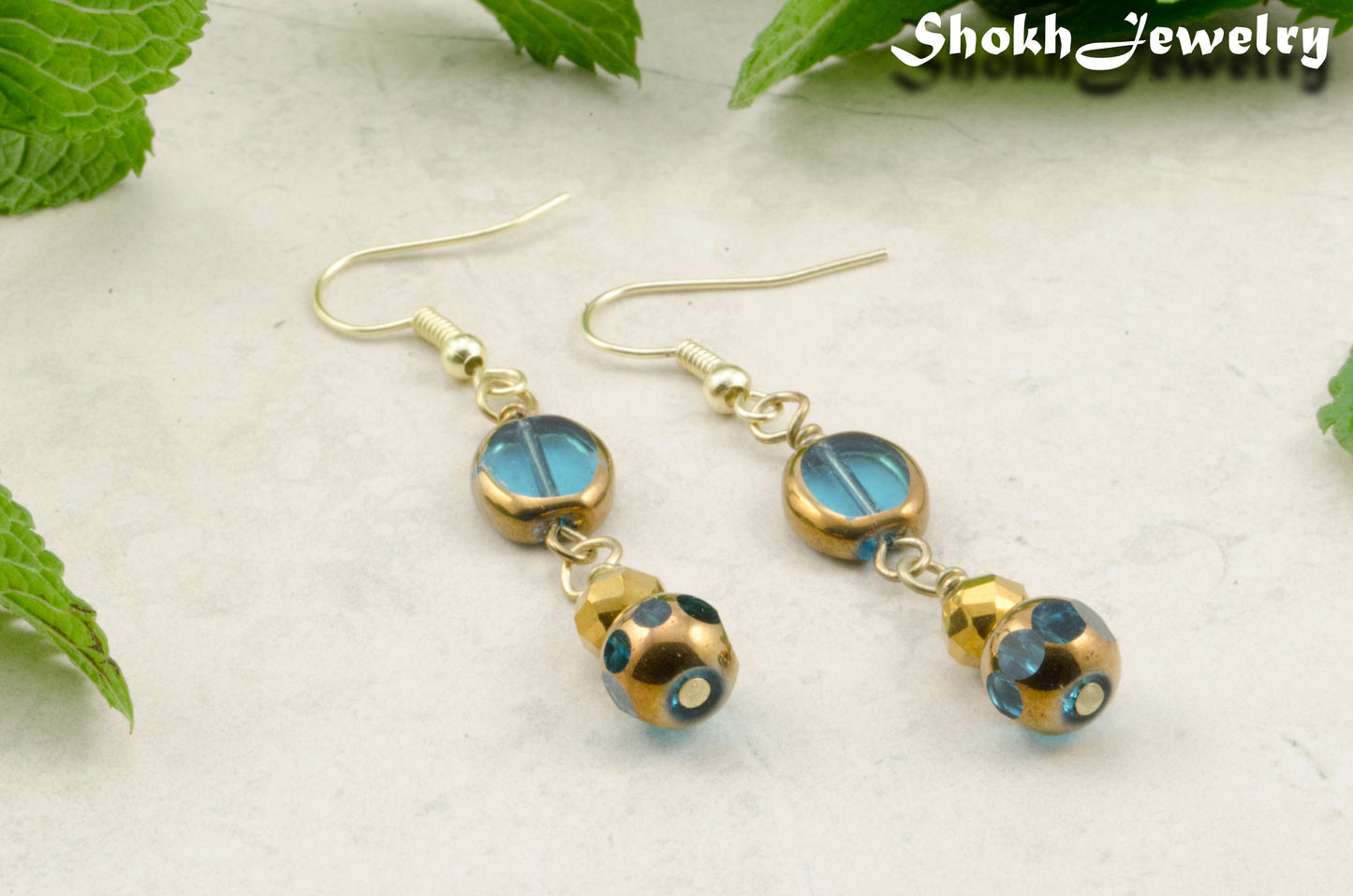 Gold and Patina Blue Glass Bead Earrings for women.