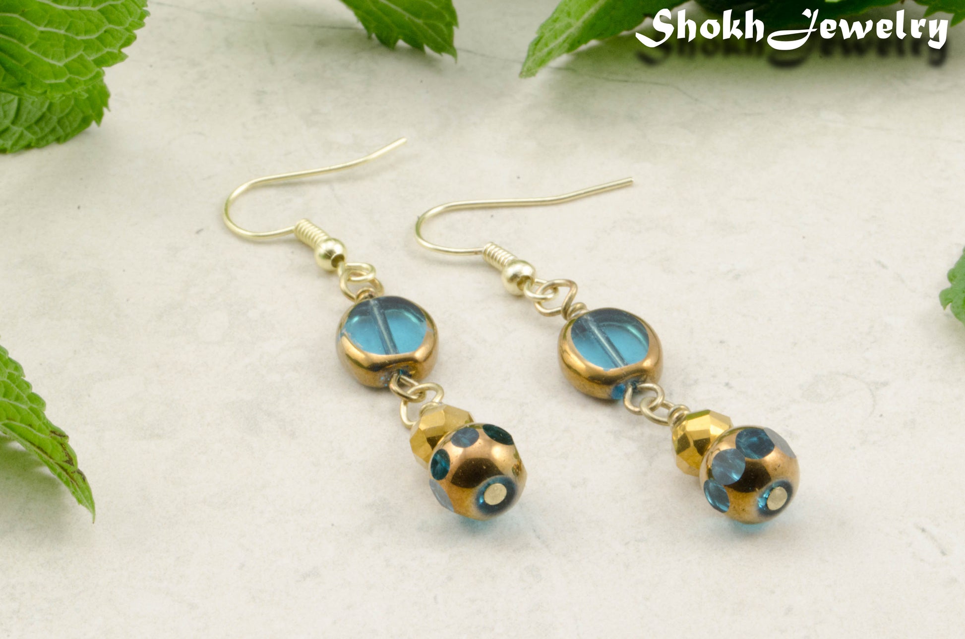 Gold and Patina Blue Glass Bead Earrings for women.