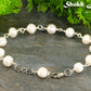 Close up of Handmade Freshwater Pearls Link Chain Bracelet.