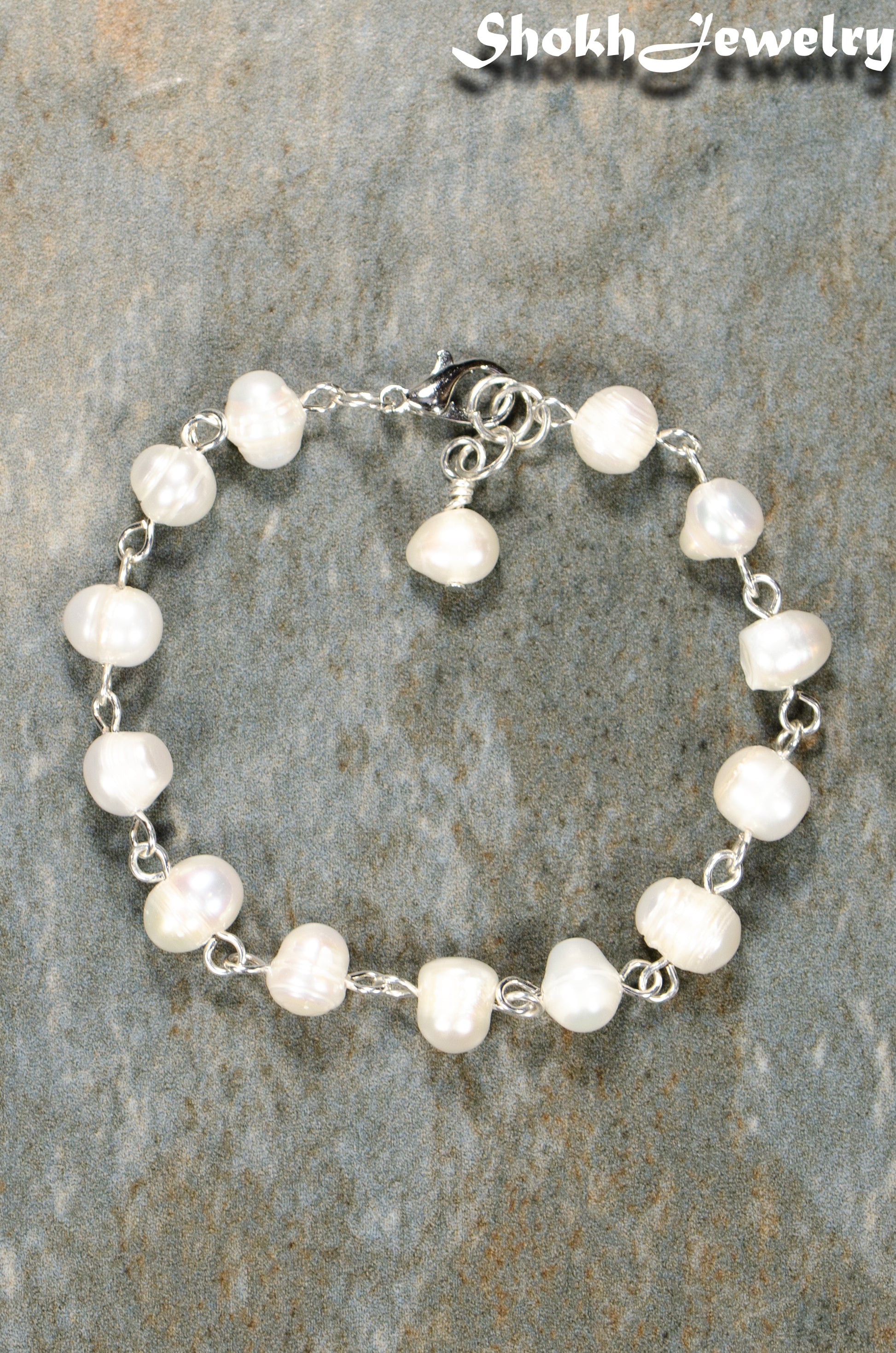 Top view of Handmade Freshwater Pearls Link Chain Bracelet.