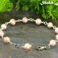 Close up of Lavender Freshwater Pearls Link Chain Bracelet.