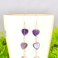 Close up of Natural Amethyst Heart Dangle Earrings.